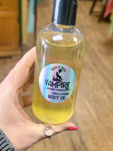 Load image into Gallery viewer, Vampire Bath &amp; Body oil - caramel, sandalwood, night blooming jasmine

